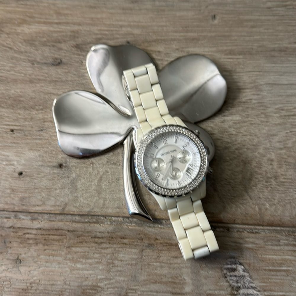Michael Kors Watch. White acrylic band. White face with crystal accents.